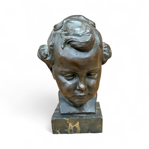 Lot 38 - A bronze bust of a boy, 20th century, signed...