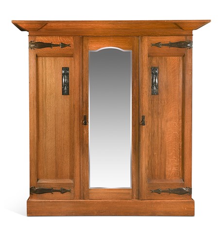 Lot 358 - Harris Lebus, London, an Arts & Crafts oak bedroom suite