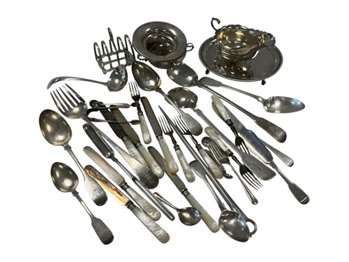 Lot 279 - A collection of silver including flatware,...