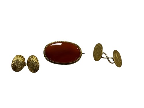 Lot 314 - A cornelian brooch stamped 'K18', together...