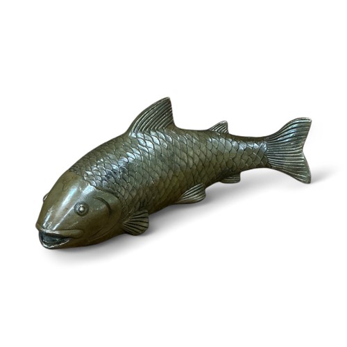Lot 131 - A bronze model of a koi carp 26cm long