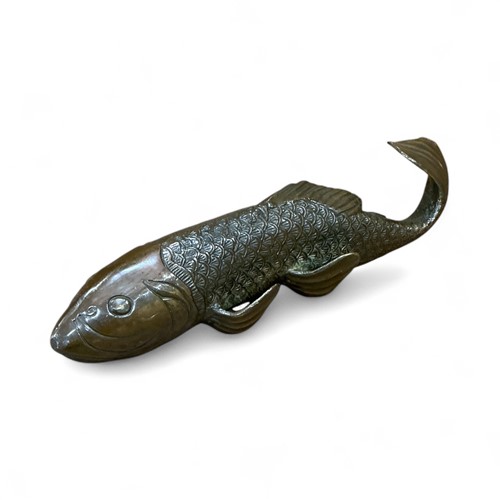 Lot 130 - A bronze model of a koi carp 28cm long