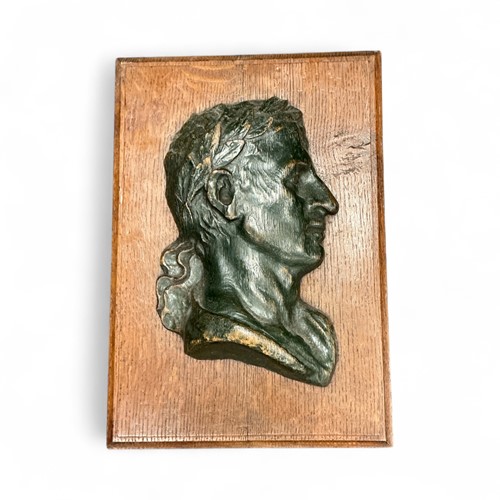 Lot 167 - Relief carving of Caesar, 42 x 29cm