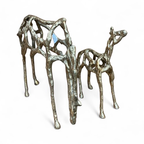 Lot 151 - two gilt skeletal models tallest 25cm high