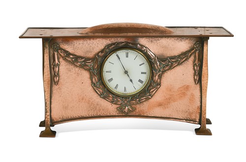 Lot 200 - In the manner of George Walton, an Arts and Crafts copper mantel clock