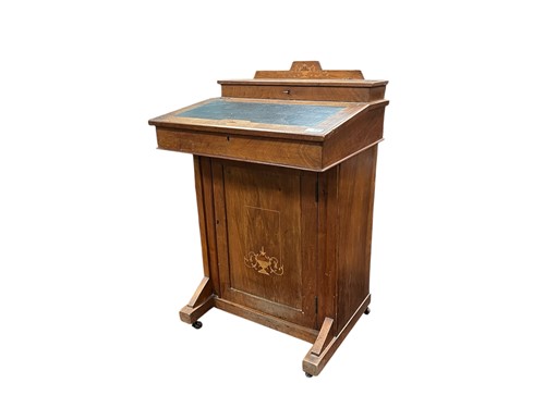 Lot 525 - An Edwardian davenport with decorative floral...