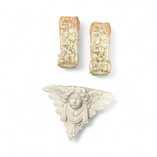 Lot 185 - A pair of terracotta corbels in the shape of...