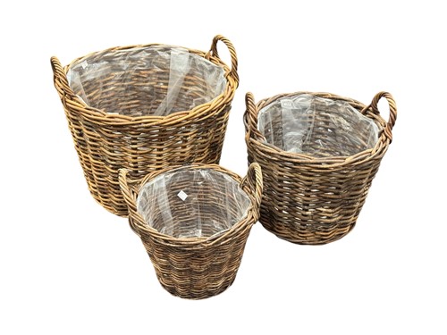 Lot 651 - A graduating set of three wicker log baskets...