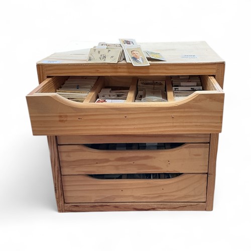 Lot 183 - A modern four drawer cabinet containing a...