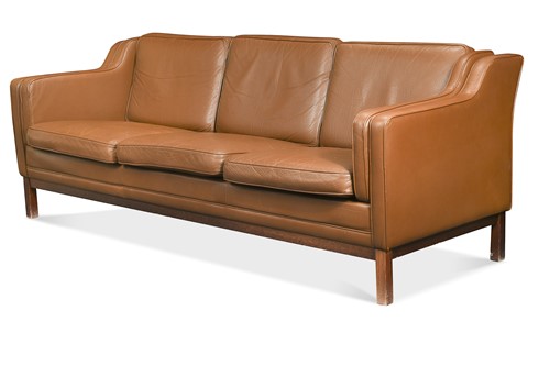 Lot 430 - A Danish mid-century brown leather three-seat sofa
