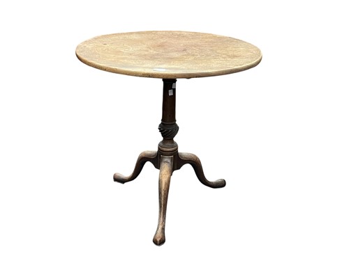 Lot 558 - A George III mahogany tripod table, circular...