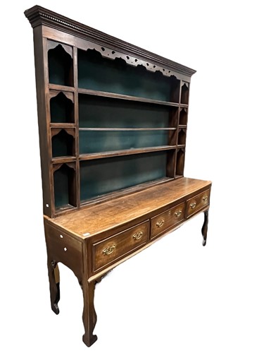 Lot 608 - A George III and later oak dresser, the plate...