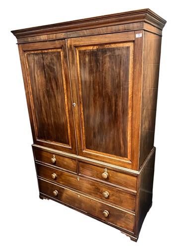 Lot 538 - A mahogany linen press, 19th century, two...