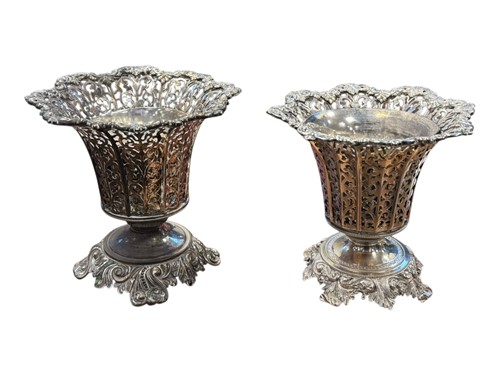 Lot 284 - A matched pair of Persian pierced bonbon...