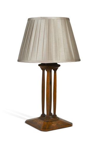 Lot 195 - An Arts and Crafts oak table lamp, early 20th century