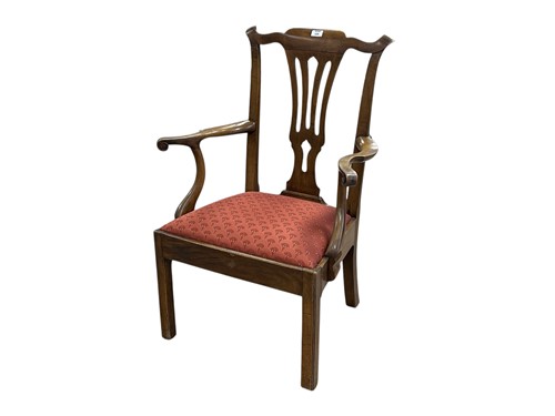 Lot 599 - A George III provincial fruitwood armchair,...