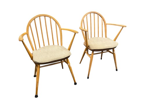 Lot 504 - A pair of Ercol elm hoop stick back chairs 83.5cm