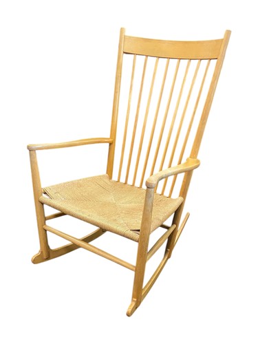 Lot 502 - A Danish Hans J. Wegner teak stickback rocking...