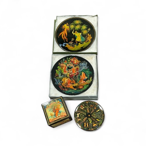 Lot 139 - A group of four Russian lacquer boxes and...