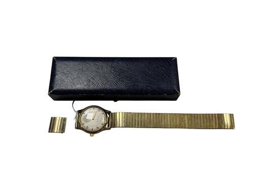 Lot 299 - A Garrard watch, case tested as 9ct gold with...