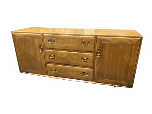 Lot 505 - An Ercol Windsor sideboard on castors 69 x 155...