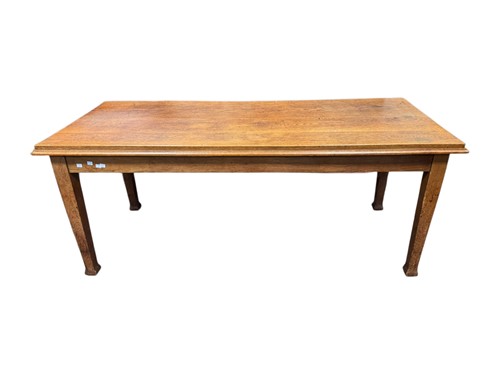Lot 541 - An early 20th century oak farmhouse table with...