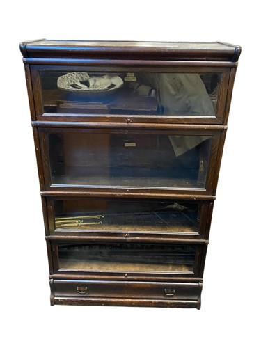 Lot 542 - An oak four tier Globe-Wernicke sectional...