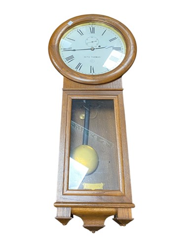Lot 554 - An oak cased Seth Thomas Regulator No.2 Wall...