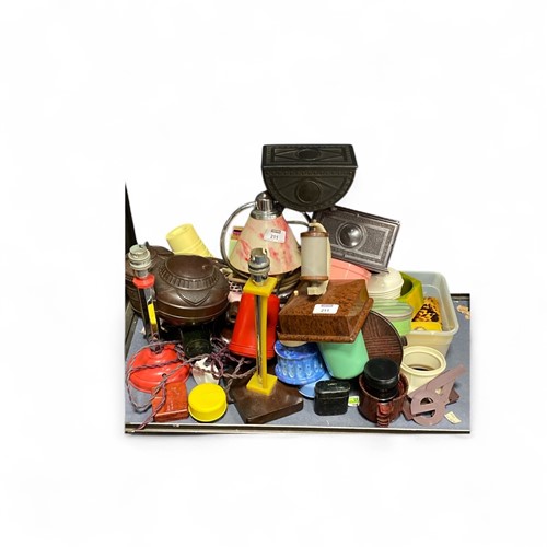 Lot 211 - A collection of bakelite to include pen stands,...