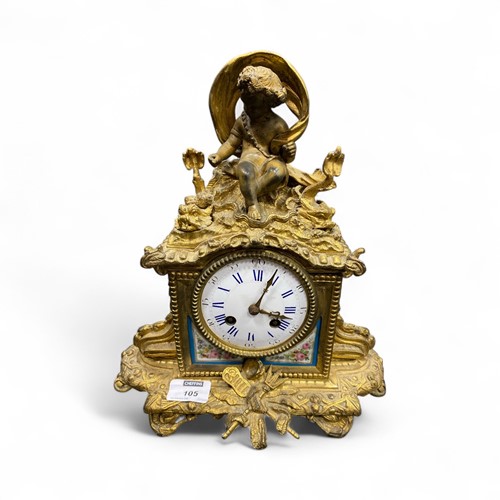 Lot 105 - A late 19th century French gilt metal mantel...