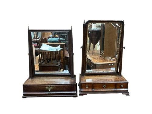 Lot 671 - A Georgian mahogany dressing table swing...