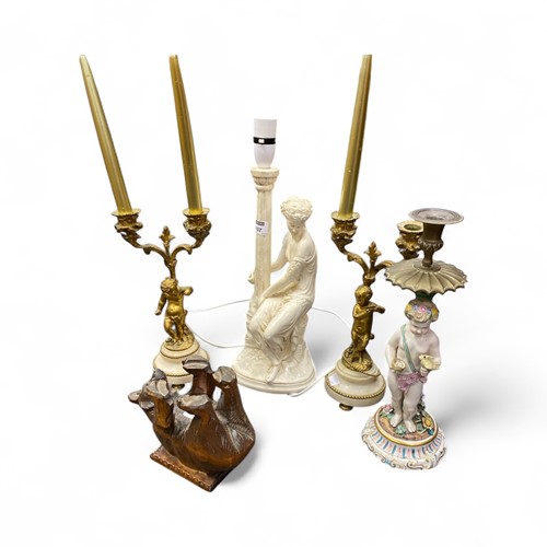 Lot 107 - A pair of 20th century figural twin branch...