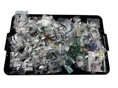 Lot 293 - A large collection of mostly black spinel,...