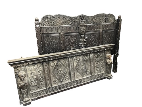 Lot 576 - An Elizabethan revival carved oak and pine bed...
