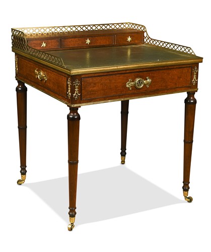 Lot A mahogany and gilt metal-mounted writing table, early 19th century