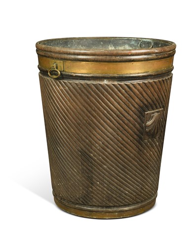 Lot A large Irish George III style mahogany and brass bound peat bucket, 20th century