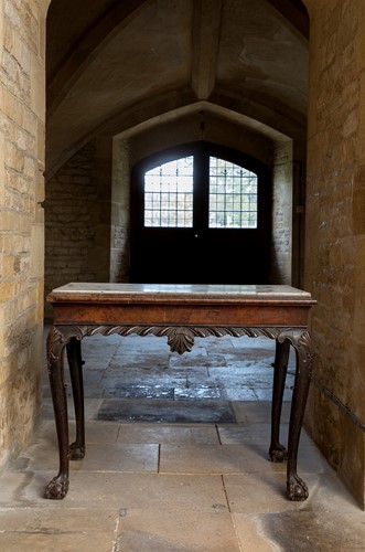 Lot A walnut side table with inset marble top, probably Irish, mid-18th century