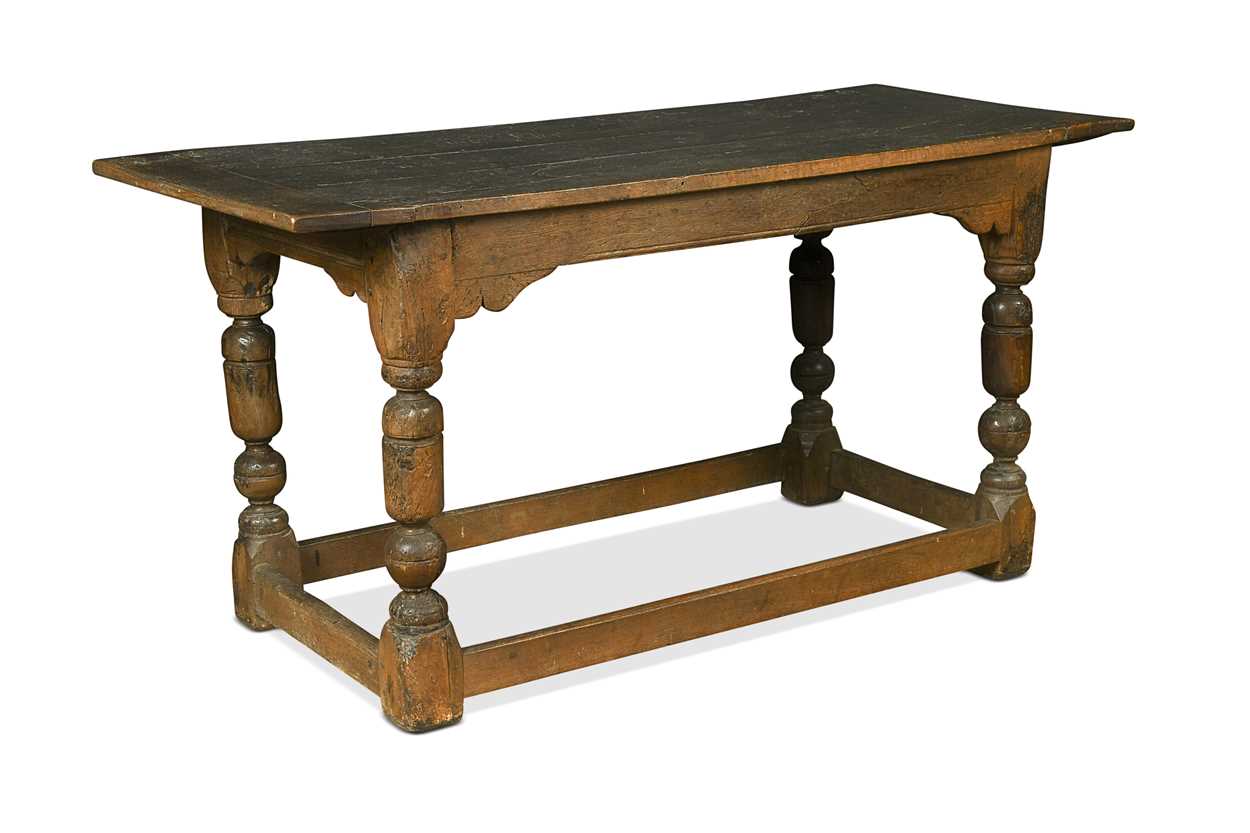 341 Table Lot 341 - An oak dining table with old graffiti-carved