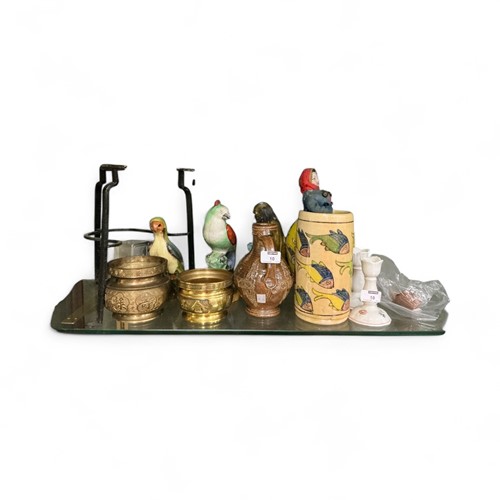 Lot 10 - Two painted pottery parrots, a brass top...