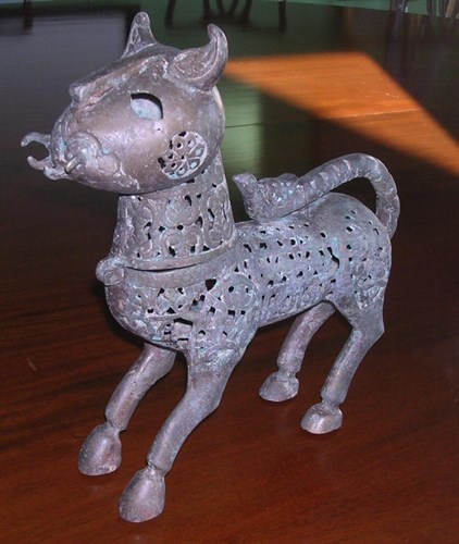 Lot 751 - A Khorasan bronze lion incense burner in the 12th century style