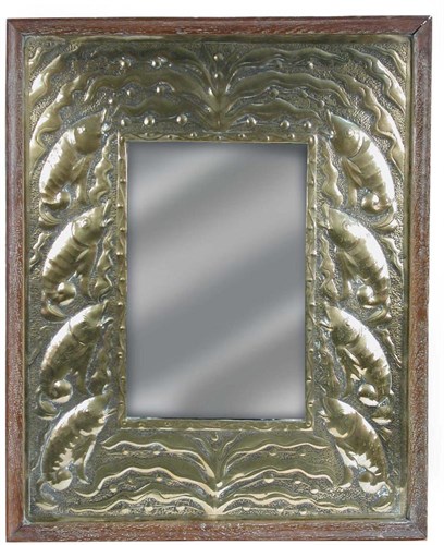 Lot 521 - An Arts & Crafts Newlyn style brass framed mirror