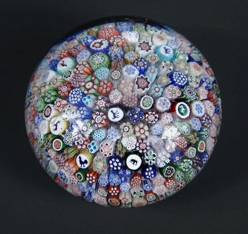 Lot 503 - A good Baccarat carpet ground paperweight with 1847 date cane
