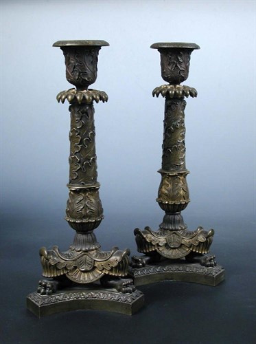 Lot 762 - A pair of early 19th century ormolu candlesticks