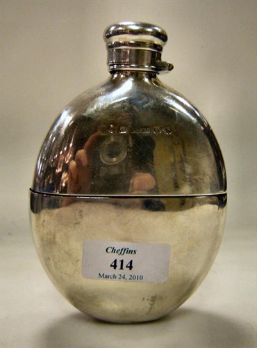 Lot 414 - A Victorian silver mounted pocket brandy flask