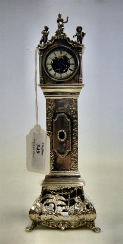 Lot 349 - A late 19th/early 20th century Dutch silver miniature longcase clock