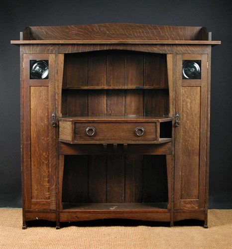 Lot 531 - A Liberty & Co. Arts & Crafts oak sideboard