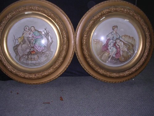 Lot 106 - A pair of late 19th century German porcelain relief plaques