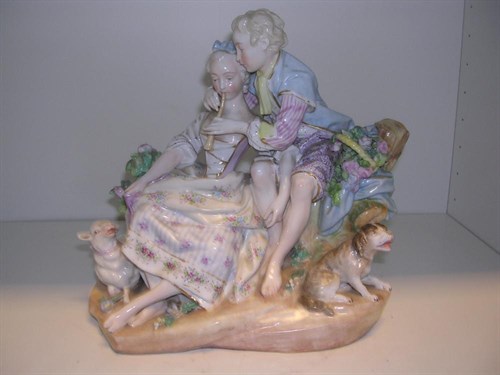 Lot 111 - 'The Horn Lesson', a late 19th century German porcelain group