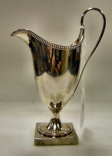 Lot 385 - A George III silver helmet creamer