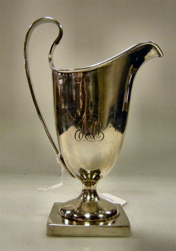 Lot 401 - An Edwardian silver helmet creamer